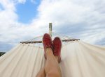 pair of red and white low top sneakers